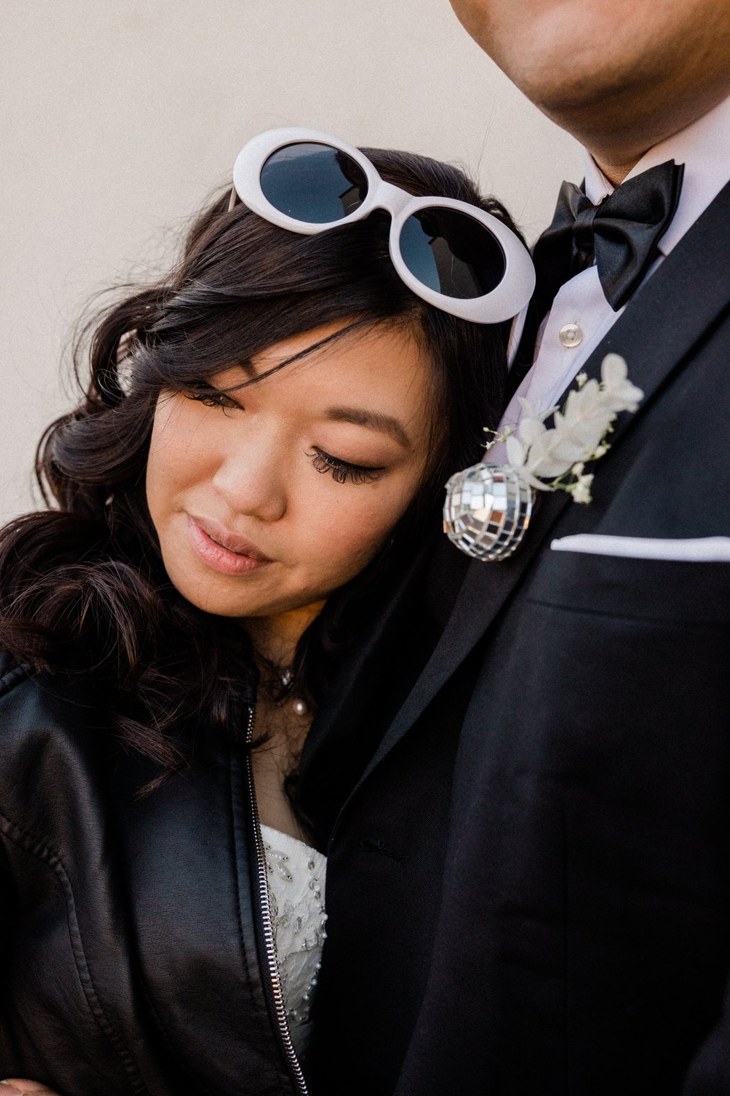 Bride Leaning on Groom's Chest